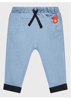 United Colors Of Benetton Spodnie dresowe 3J74GF00X Niebieski Regular Fit ze sklepu MODIVO w kategorii Spodnie chłopięce - zdjęcie 172288747