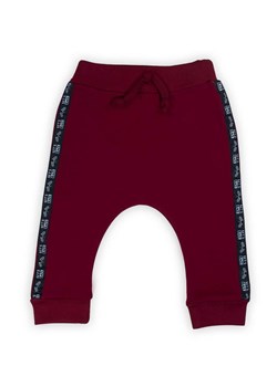 Bordowe spodnie dresowe dla chłopca ze sklepu 5.10.15 w kategorii Spodnie i półśpiochy - zdjęcie 172302015