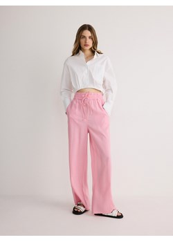 Reserved - Spodnie z modalu - pastelowy róż ze sklepu Reserved w kategorii Spodnie damskie - zdjęcie 172310418