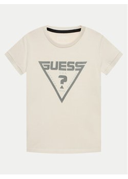 Guess T-Shirt L4GI34 J1314 Écru Regular Fit ze sklepu MODIVO w kategorii T-shirty chłopięce - zdjęcie 172325695