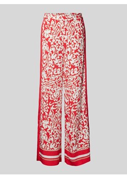 Spodnie materiałowe z szerokimi nogawkami i nadrukiem na całej powierzchni ze sklepu Peek&Cloppenburg  w kategorii Spodnie damskie - zdjęcie 172329688