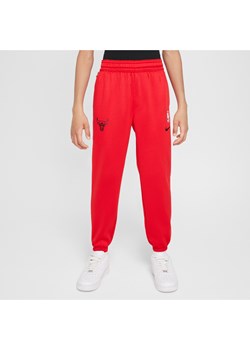 Spodnie dla dużych dzieci Nike Dri-FIT NBA Chicago Bulls Spotlight - Czerwony ze sklepu Nike poland w kategorii Spodnie chłopięce - zdjęcie 172330157