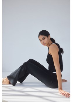 H & M - Rozszerzane spodnie dżersejowe - Czarny ze sklepu H&M w kategorii Spodnie damskie - zdjęcie 172330445