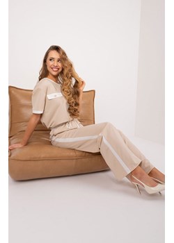 Spodnie damskie z wiązaniem beżowe LK-SP-509611.91, Kolor beżowy, Rozmiar L/XL, Lakerta ze sklepu Primodo w kategorii Spodnie damskie - zdjęcie 172332129