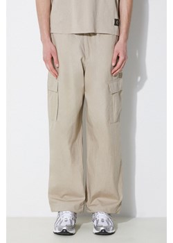 Champion spodnie bawełniane kolor beżowy w fasonie cargo 220015 ze sklepu PRM w kategorii Spodnie męskie - zdjęcie 172333678