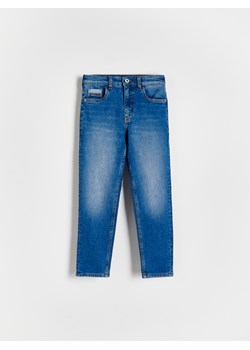 Reserved - Elastyczne jeansy regular - granatowy ze sklepu Reserved w kategorii Spodnie chłopięce - zdjęcie 172337135
