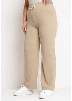 Beżowe Proste Szerokie Spodnie z Gumką w Pasie i Wysokim Stanem Trantia ze sklepu Born2be Odzież w kategorii Spodnie damskie - zdjęcie 172339555