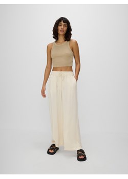 Reserved - Spodnie z wiskozy - złamana biel ze sklepu Reserved w kategorii Spodnie damskie - zdjęcie 172356855