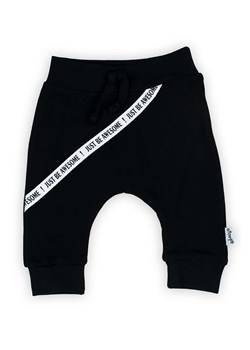 Czarne bawełniane spodnie dresowe niemowlęce ze sklepu 5.10.15 w kategorii Spodnie i półśpiochy - zdjęcie 172378867