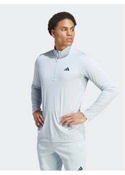 adidas Koszulka techniczna Train Essentials Seasonal Training IJ9620 Błękitny Regular Fit ze sklepu MODIVO w kategorii T-shirty męskie - zdjęcie 172390127