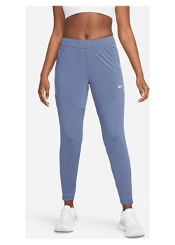 Damskie spodnie do biegania Nike Dri-FIT Essential - Niebieski ze sklepu Nike poland w kategorii Spodnie damskie - zdjęcie 172393306