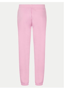 Guess Spodnie dresowe Kiara V4GB1 4FL04P Różowy Regular Fit ze sklepu MODIVO w kategorii Spodnie damskie - zdjęcie 172400697
