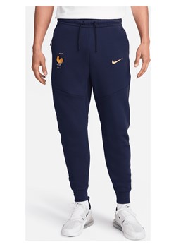 Męskie joggery piłkarskie Nike FFF Tech Fleece - Niebieski ze sklepu Nike poland w kategorii Spodnie męskie - zdjęcie 172407288