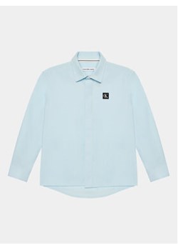 Calvin Klein Jeans Koszula Ceremony IB0IB01962 Błękitny Regular Fit ze sklepu MODIVO w kategorii Koszule chłopięce - zdjęcie 172415725