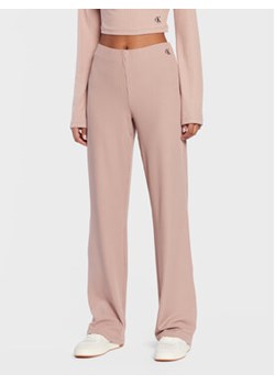 Calvin Klein Jeans Spodnie materiałowe J20J220270 Beżowy Relaxed Fit ze sklepu MODIVO w kategorii Spodnie damskie - zdjęcie 172415737