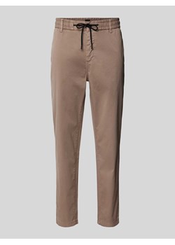 Chinosy o kroju tapered fit z elastycznym pasem ze sklepu Peek&Cloppenburg  w kategorii Spodnie męskie - zdjęcie 172417489