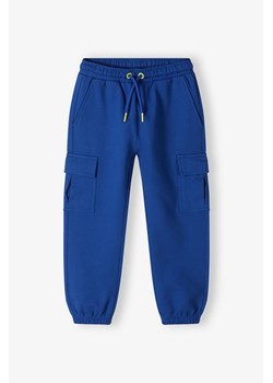 Dresowe spodnie bojówki dla chłopca - niebieskie - 5.10.15. ze sklepu 5.10.15 w kategorii Spodnie chłopięce - zdjęcie 172420176
