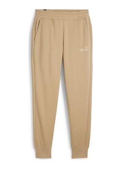 Puma Spodnie dresowe &quot;ESS&quot; w kolorze beżowym ze sklepu Limango Polska w kategorii Spodnie damskie - zdjęcie 172423815