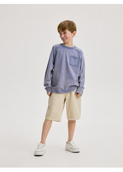 Reserved - Longsleeve oversize z kieszenią - niebieski ze sklepu Reserved w kategorii T-shirty chłopięce - zdjęcie 172432567