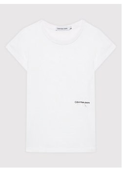 Calvin Klein Jeans T-Shirt Monogram Off Placed IG0IG01297 Biały Slim Fit ze sklepu MODIVO w kategorii Bluzki dziewczęce - zdjęcie 172442648