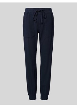 Spodnie sportowe w jednolitym kolorze model ‘KANAYA’ ze sklepu Peek&Cloppenburg  w kategorii Spodnie damskie - zdjęcie 172537138