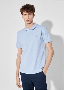 Błękitna koszulka polo z naszywką ze sklepu OCHNIK w kategorii T-shirty męskie - zdjęcie 172551315