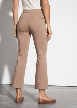 Beżowe spodnie damskie ze sklepu OCHNIK w kategorii Spodnie damskie - zdjęcie 172554556