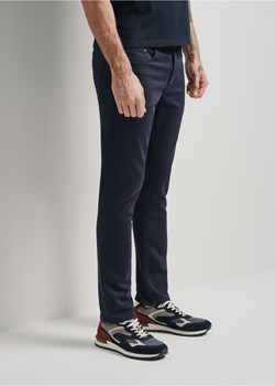 Granatowe spodnie męskie ze sklepu OCHNIK w kategorii Spodnie męskie - zdjęcie 172556978