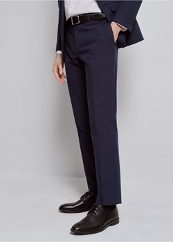 Granatowe spodnie garniturowe męskie ze sklepu OCHNIK w kategorii Spodnie męskie - zdjęcie 172560655