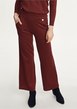 Bordowe błyszczące spodnie damskie ze sklepu OCHNIK w kategorii Spodnie damskie - zdjęcie 172562595