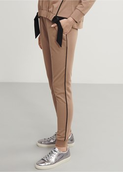 Spodnie dresowe damskie z lampasami ze sklepu OCHNIK w kategorii Spodnie damskie - zdjęcie 172564677