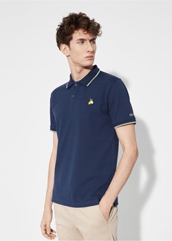 Granatowa koszulka polo z naszywką ze sklepu OCHNIK w kategorii T-shirty męskie - zdjęcie 172565169