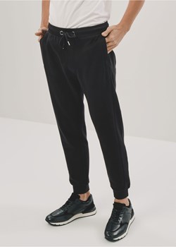 Czarne joggery dresowe męskie ze sklepu OCHNIK w kategorii Spodnie męskie - zdjęcie 172565589