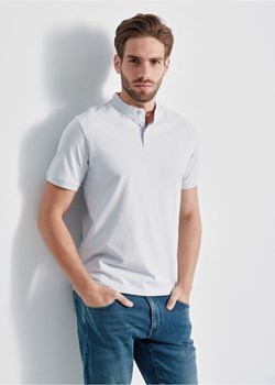 Błękitna koszulka polo ze stójką ze sklepu OCHNIK w kategorii T-shirty męskie - zdjęcie 172568439