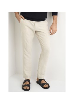 Beżowe lniane spodnie męskie ze sklepu OCHNIK w kategorii Spodnie męskie - zdjęcie 172571486