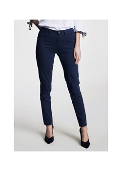 Granatowe spodnie skinny damskie ze sklepu OCHNIK w kategorii Spodnie damskie - zdjęcie 172593948