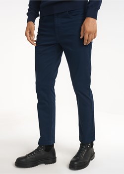 Granatowe spodnie męskie ze sklepu OCHNIK w kategorii Spodnie męskie - zdjęcie 172593987