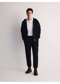 Reserved - Bawełniane spodnie dresowe - granatowy ze sklepu Reserved w kategorii Spodnie męskie - zdjęcie 172599858