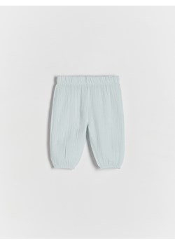 Reserved - Spodnie z bawełnianego muślinu - jasnoniebieski ze sklepu Reserved w kategorii Spodnie i półśpiochy - zdjęcie 172619959