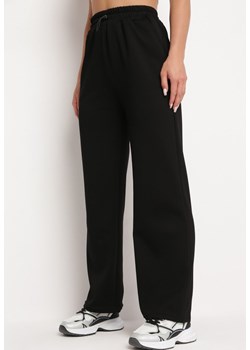 Czarne Klasyczne Szerokie Spodnie z Wysokim Stanem i Gumką w Pasie Lortia ze sklepu Born2be Odzież w kategorii Spodnie damskie - zdjęcie 172635567