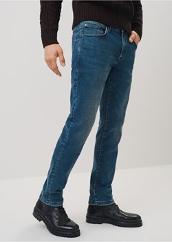 Granatowe jeansy męskie w stylu vintage ze sklepu OCHNIK w kategorii Jeansy męskie - zdjęcie 172639818