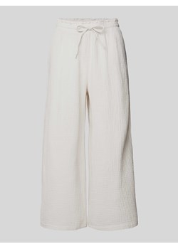 Spodnie materiałowe o luźnym kroju z tunelem ze sklepu Peek&Cloppenburg  w kategorii Spodnie damskie - zdjęcie 172640918
