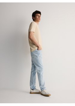 Reserved - Jeansy slim fit z przetarciami - niebieski ze sklepu Reserved w kategorii Jeansy męskie - zdjęcie 172654896