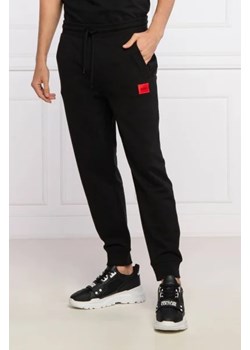 HUGO Spodnie dresowe Doak212 | Regular Fit ze sklepu Gomez Fashion Store w kategorii Spodnie męskie - zdjęcie 172938547