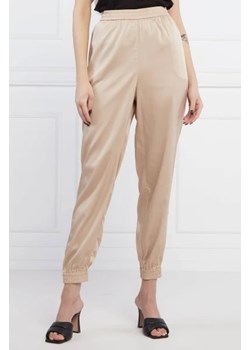 GUESS Spodnie JAY | Loose fit ze sklepu Gomez Fashion Store w kategorii Spodnie damskie - zdjęcie 172945639