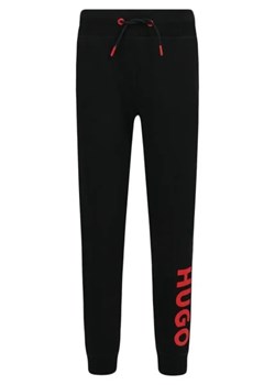 HUGO KIDS Spodnie dresowe | Regular Fit ze sklepu Gomez Fashion Store w kategorii Spodnie chłopięce - zdjęcie 172946416