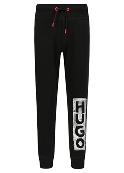 HUGO KIDS Spodnie dresowe | Regular Fit ze sklepu Gomez Fashion Store w kategorii Spodnie chłopięce - zdjęcie 172947447
