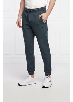 GUESS Spodnie dresowe ADAM | Slim Fit ze sklepu Gomez Fashion Store w kategorii Spodnie męskie - zdjęcie 172949079
