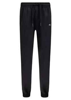 CALVIN KLEIN JEANS Spodnie jogger | Regular Fit ze sklepu Gomez Fashion Store w kategorii Spodnie chłopięce - zdjęcie 172949875