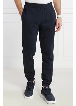 Tommy Hilfiger Spodnie dresowe GLOBAL STRIPE | Regular Fit ze sklepu Gomez Fashion Store w kategorii Spodnie męskie - zdjęcie 172956405